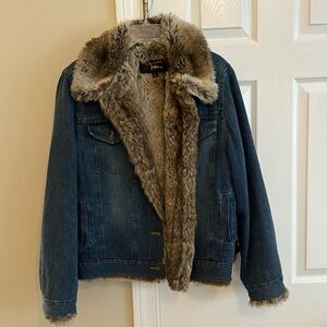 Denim jacket with thick fur lining.
